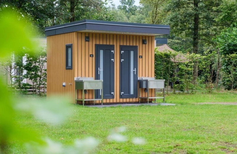 Camping pitch with private sanitary facilities