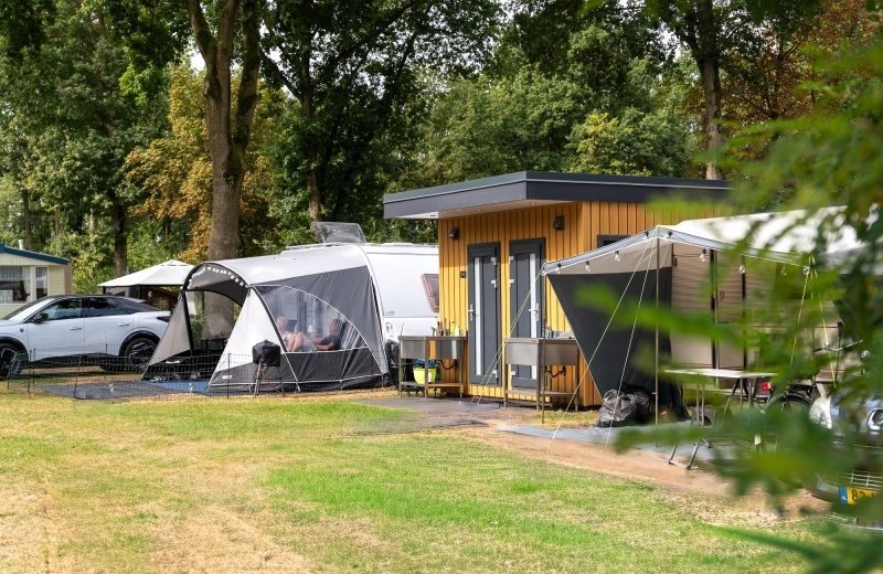 Camping pitch with private sanitary facilities